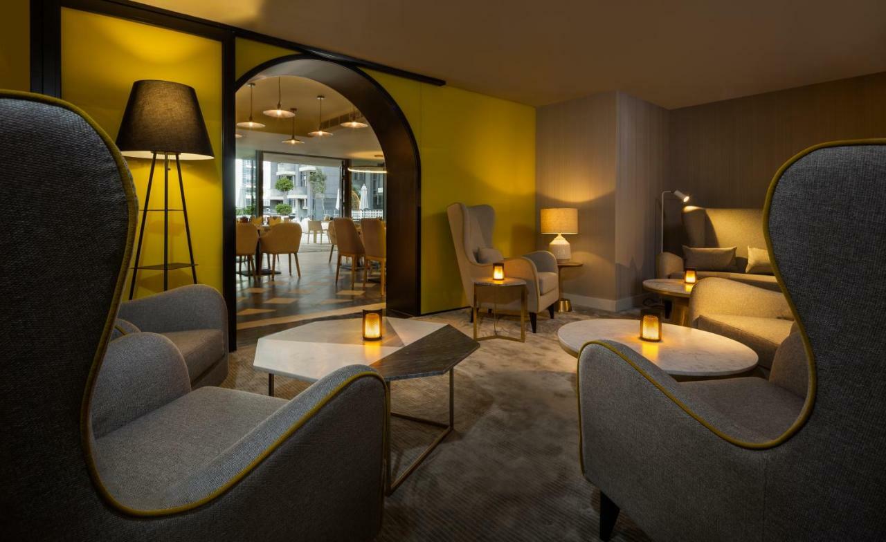 الشقق الفندقية دبيفي  ميلينيوم أتريا بيزنس باي المظهر الخارجي الصورة The lounge at the hotel